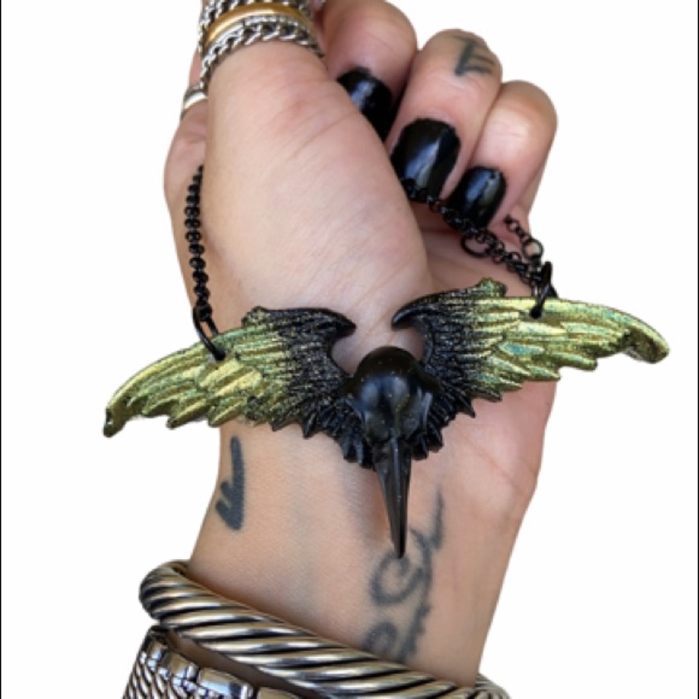Black & yellow glitter resin skull crow necklace